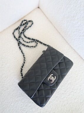CHANEL Black Quilted Lambskin Crossbody Bag with Silver Hardware